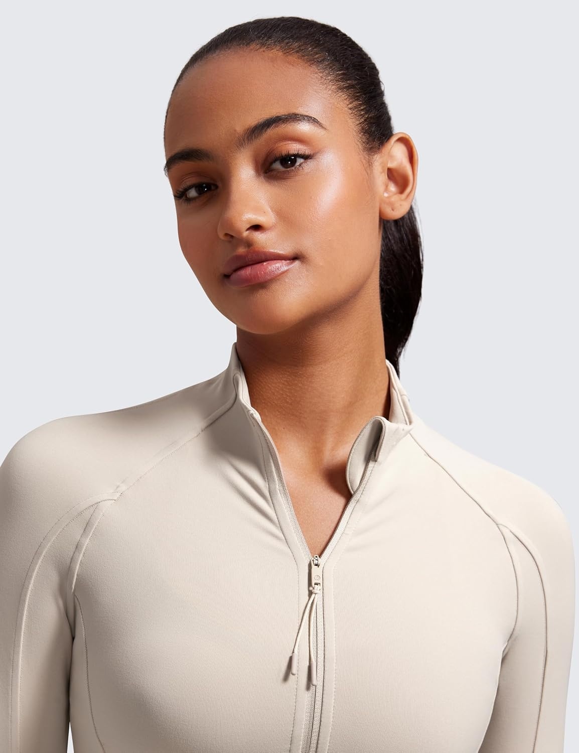 image:imageCRZ YOGA Butterluxe Waist Length Jackets for Women Full Zip Athletic Track Tops with Thumb Holes PocketsMojave Tan