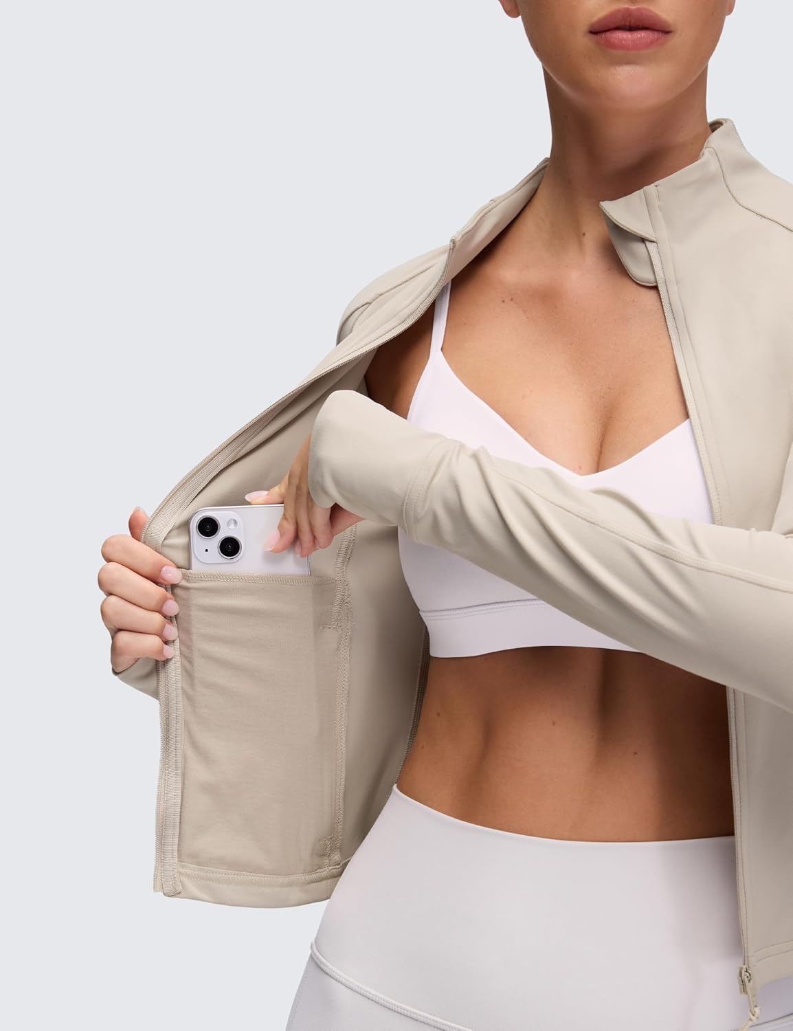 image:imageCRZ YOGA Butterluxe Waist Length Jackets for Women Full Zip Athletic Track Tops with Thumb Holes PocketsMojave Tan
