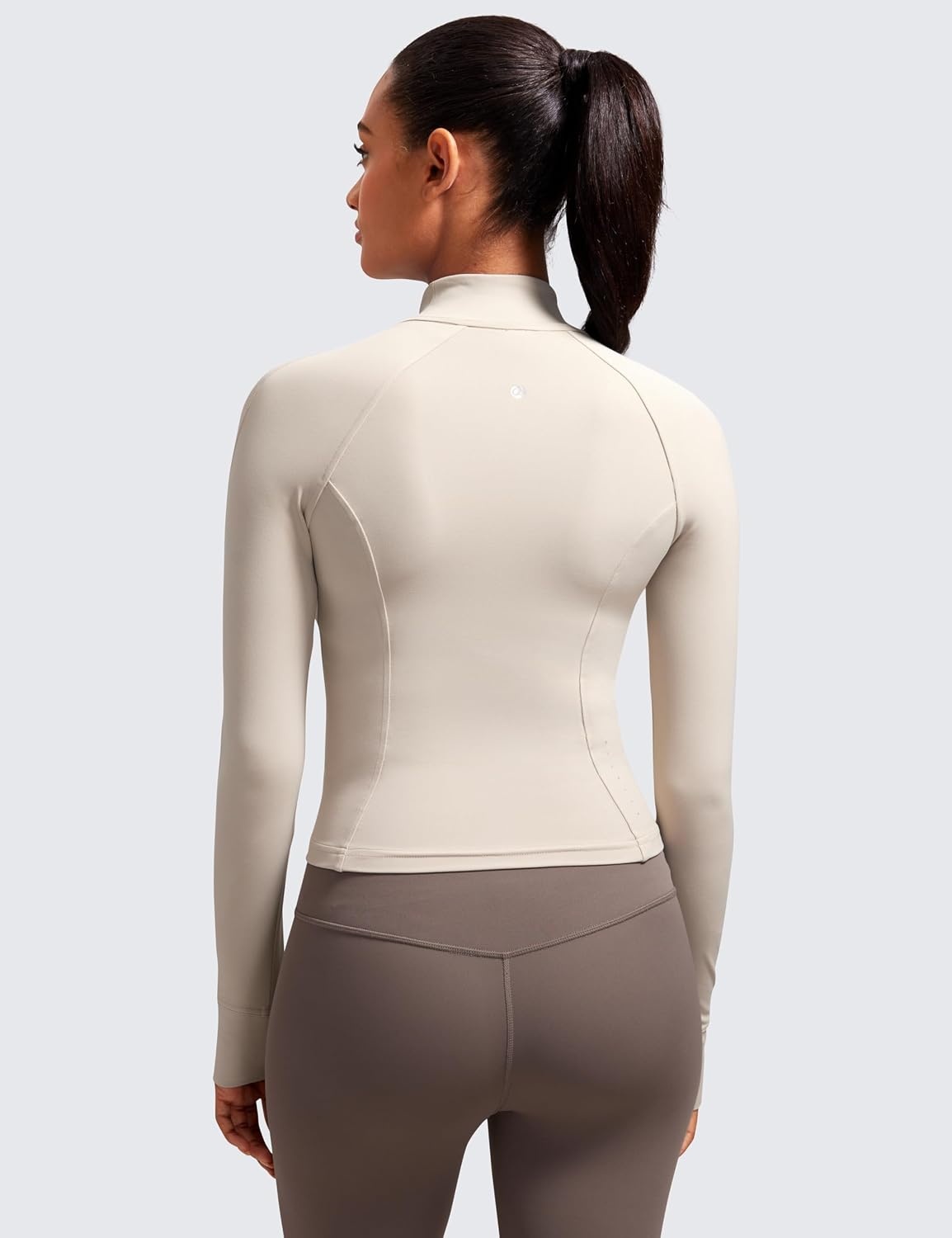 image:imageCRZ YOGA Butterluxe Waist Length Jackets for Women Full Zip Athletic Track Tops with Thumb Holes PocketsMojave Tan