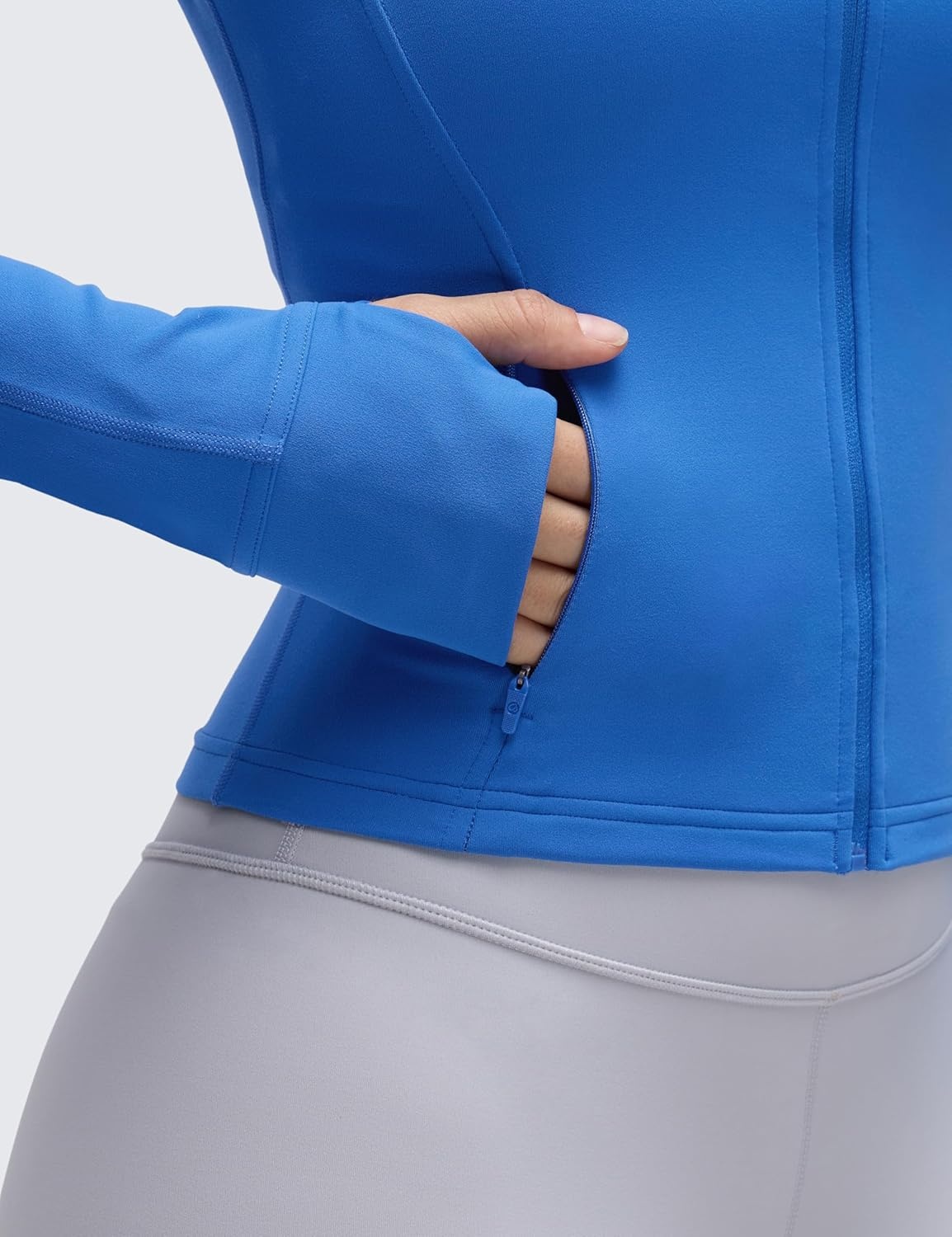 image:imageCRZ YOGA Butterluxe Waist Length Jackets for Women Full Zip Athletic Track Tops with Thumb Holes PocketsSparkle Blue
