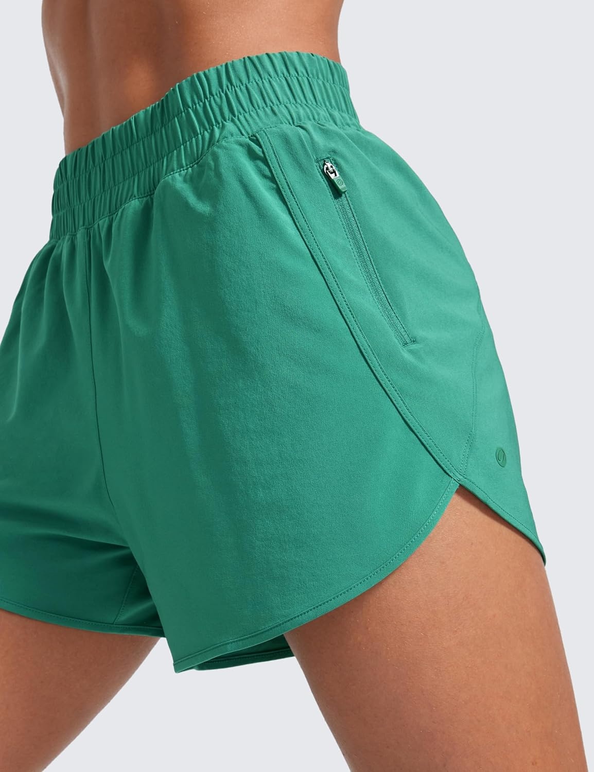 image:imageCRZ YOGA Dolphin Athletic Shorts for Women 3 High Waisted Quick Dry for Running Workout Gym Track with Zip PocketCascadia Green