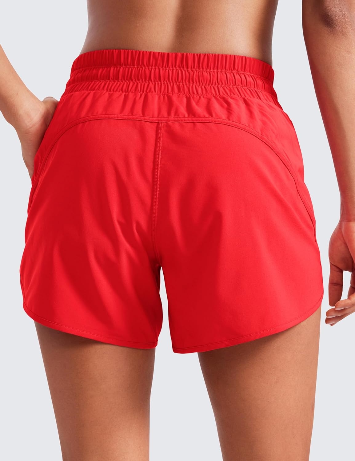 image:imageCRZ YOGA Dolphin Athletic Shorts for Women 5 Mid Waisted Quick Dry for Running Workout Gym Track with Zip PocketDeep Red