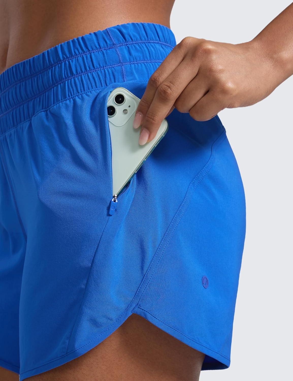 image:imageCRZ YOGA Dolphin Athletic Shorts for Women 5 Mid Waisted Quick Dry for Running Workout Gym Track with Zip PocketSparkle Blue