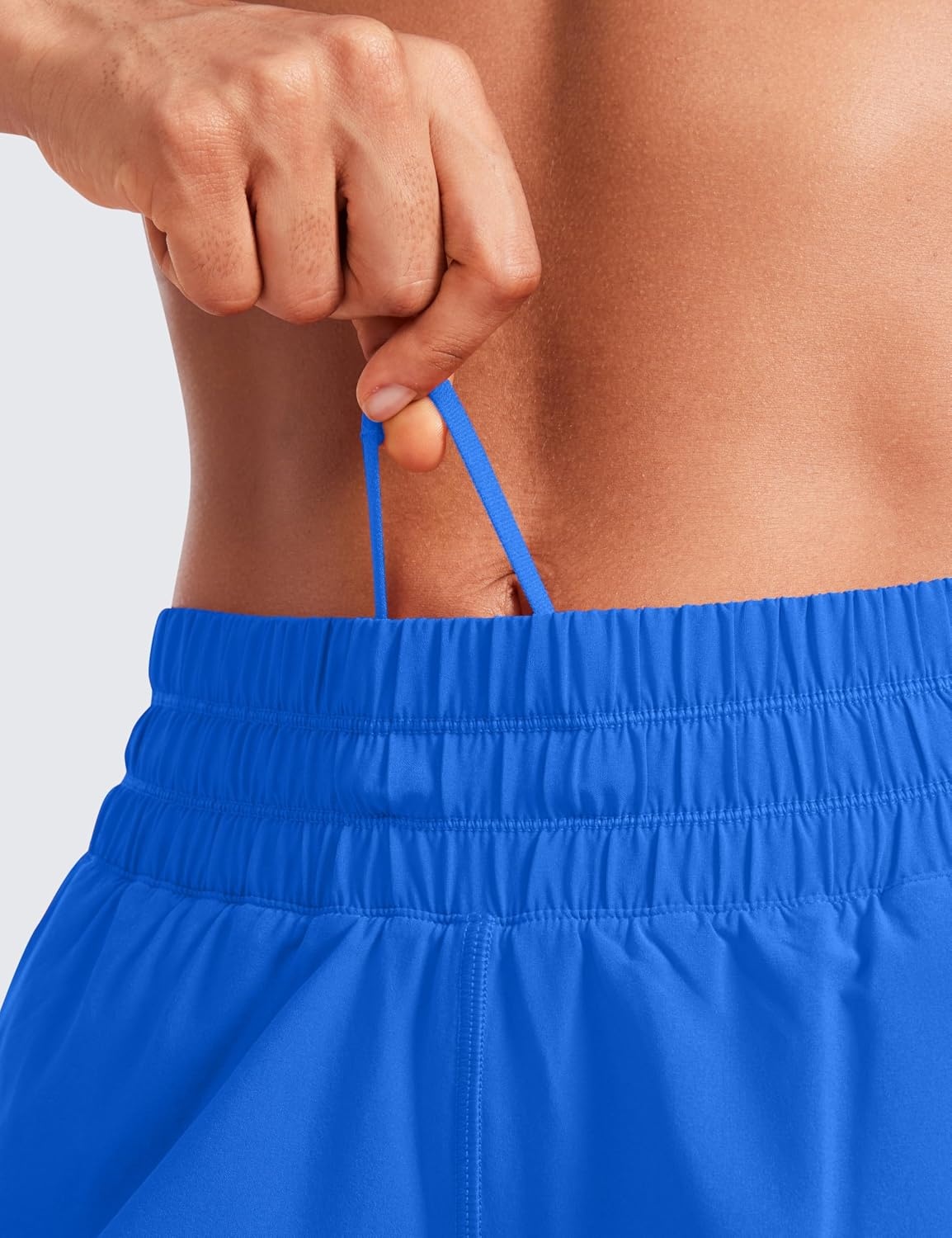 image:imageCRZ YOGA Dolphin Athletic Shorts for Women 5 Mid Waisted Quick Dry for Running Workout Gym Track with Zip PocketSparkle Blue