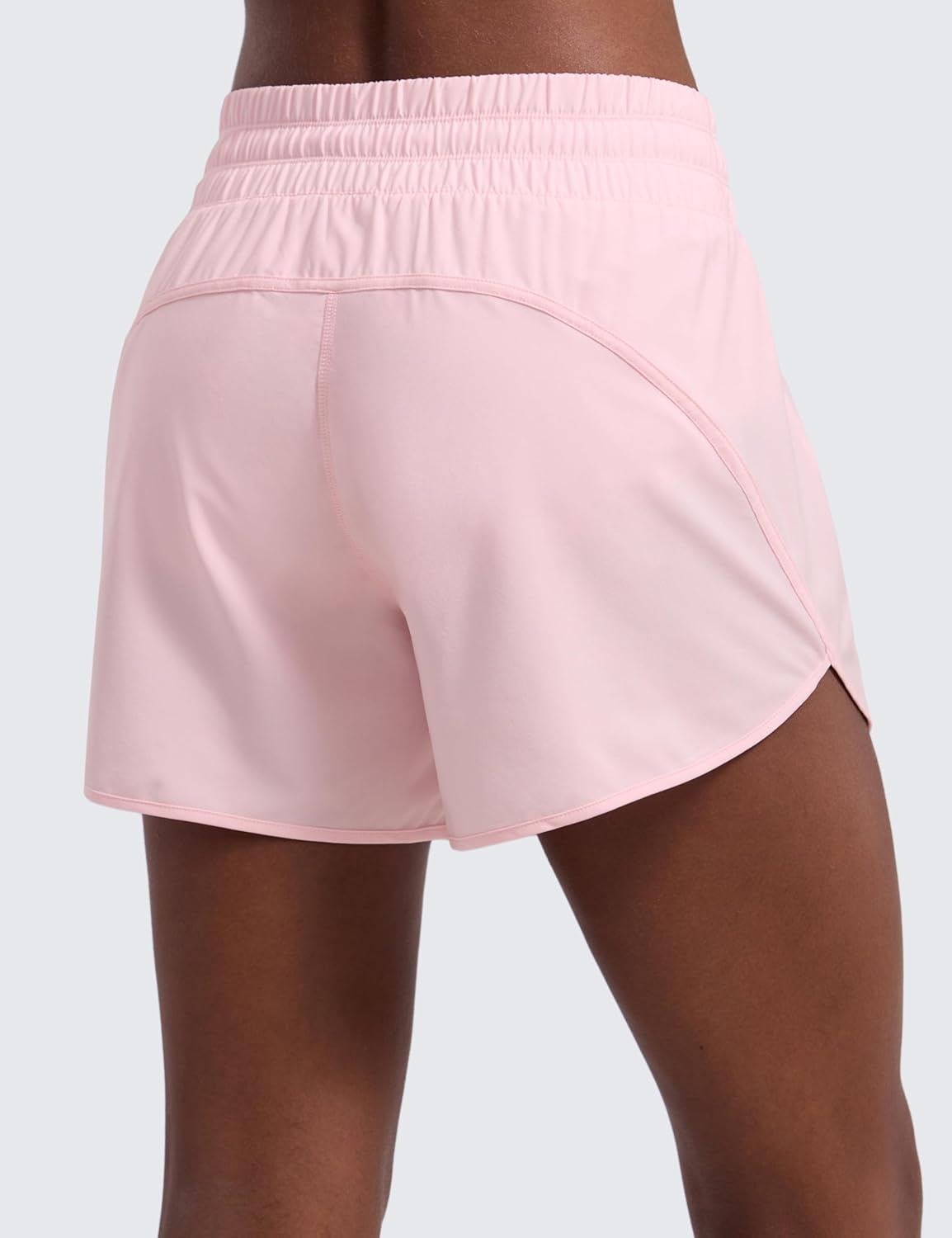 image:imageCRZ YOGA Dolphin Athletic Shorts for Women 5 Mid Waisted Quick Dry for Running Workout Gym Track with Zip PocketStrawberry Pink
