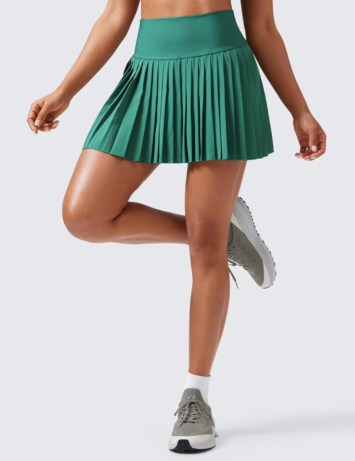 image:imageCRZ YOGA High Waisted Pleated Tennis Skirts for Women Mini Lined Casual Tummy Control Skort with PocketsCascadia Green