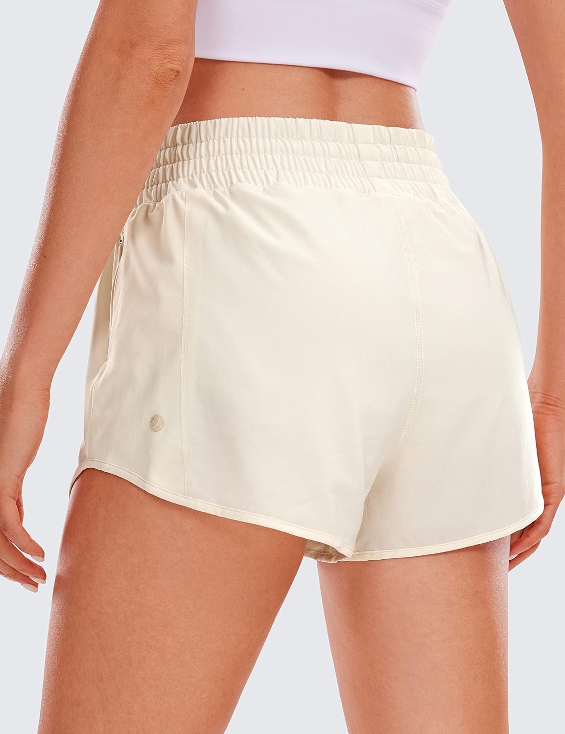 image:imageCRZ YOGA High Waisted Running Shorts for Women 25 Mesh Liner Quick Dry for Workout Sport Athletic with Zipper PocketWhite Apricot