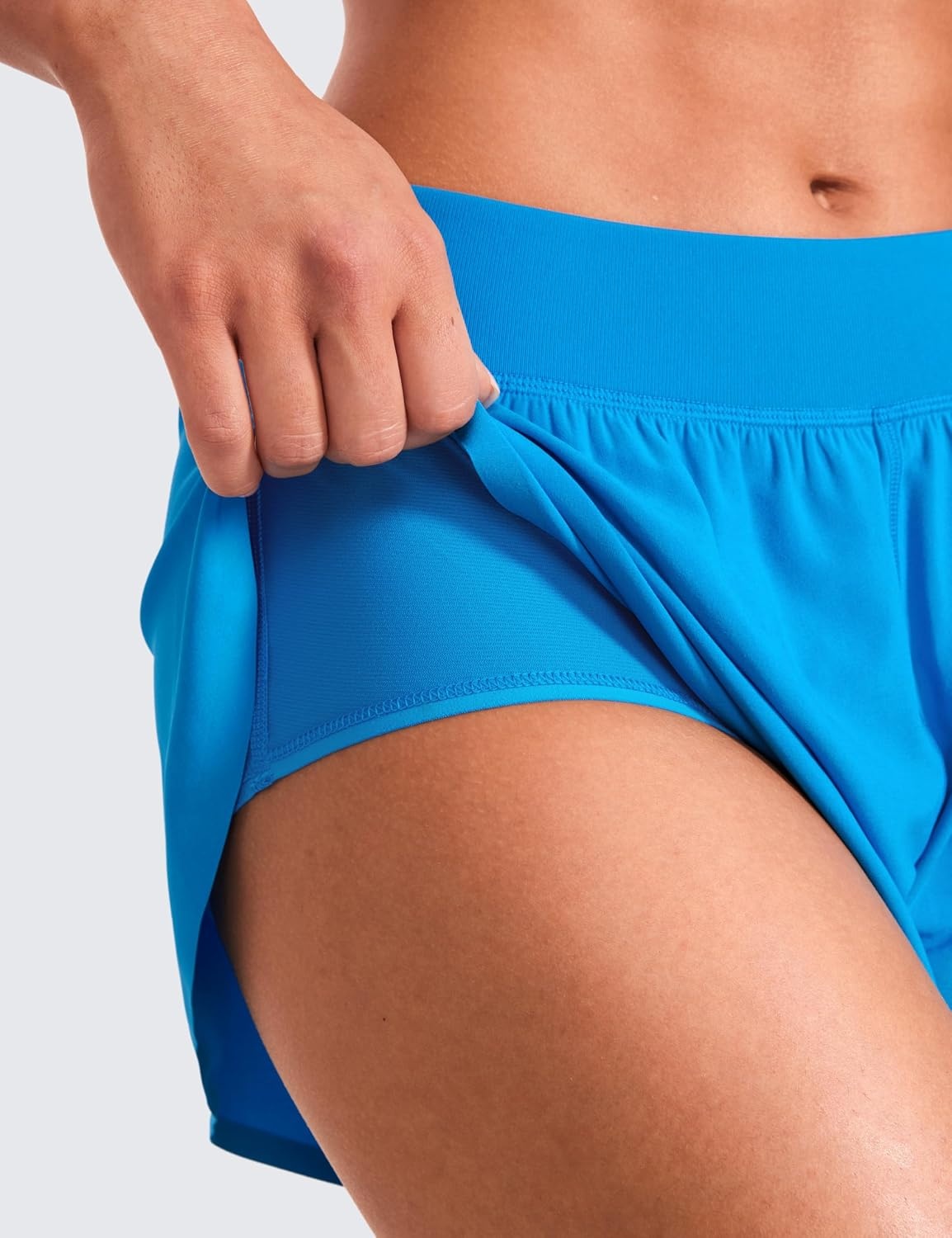 image:imageCRZ YOGA Mid Waisted Split Running Shorts for Women 4 Comfy Mesh Liner for Workout Athletic Gym Track Quick DryMadagascar Blue