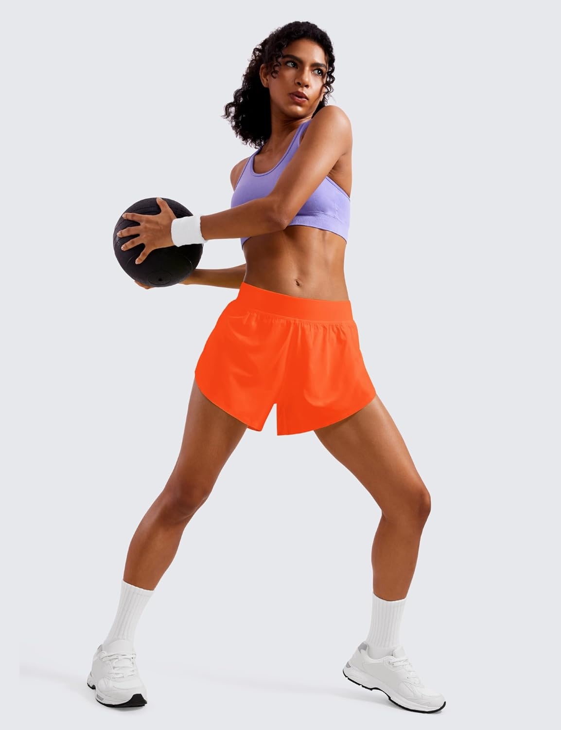 image:imageCRZ YOGA Mid Waisted Split Running Shorts for Women 4 Comfy Mesh Liner for Workout Athletic Gym Track Quick DryNeon Orange
