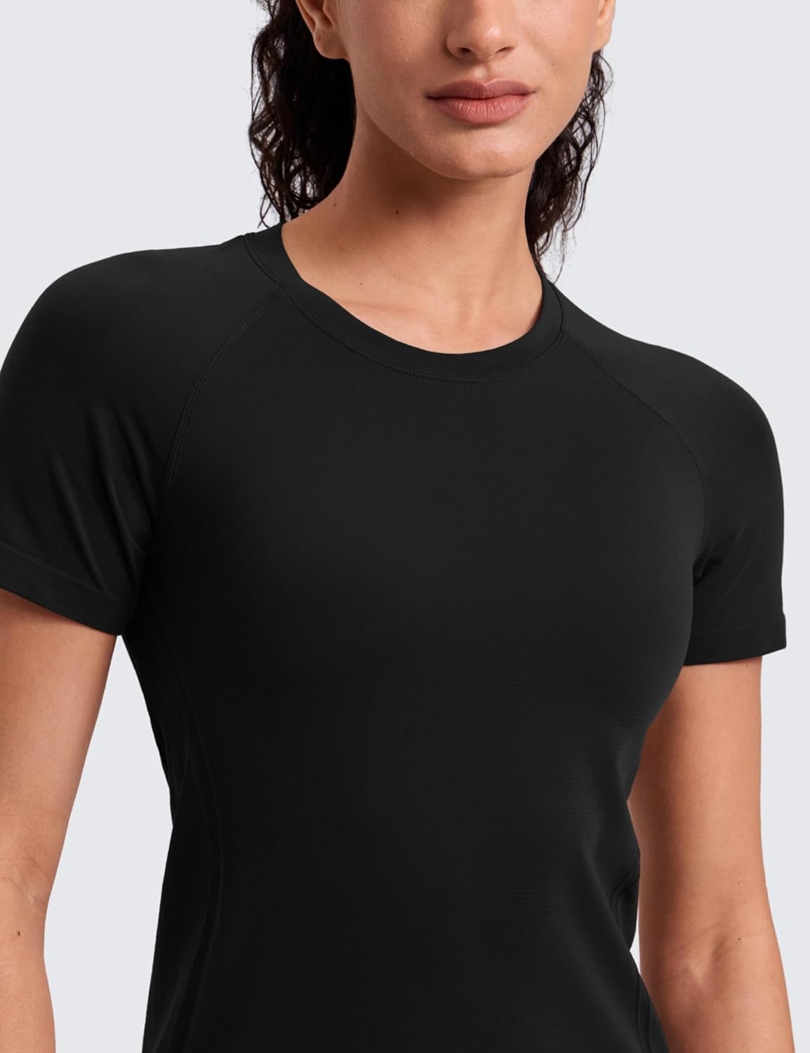 image:imageCRZ YOGA Seamless Workout Tops for Women Hip Length Athletic Running Gym Yoga Short Sleeve Shirts Breathable Crewneck TeesBlack