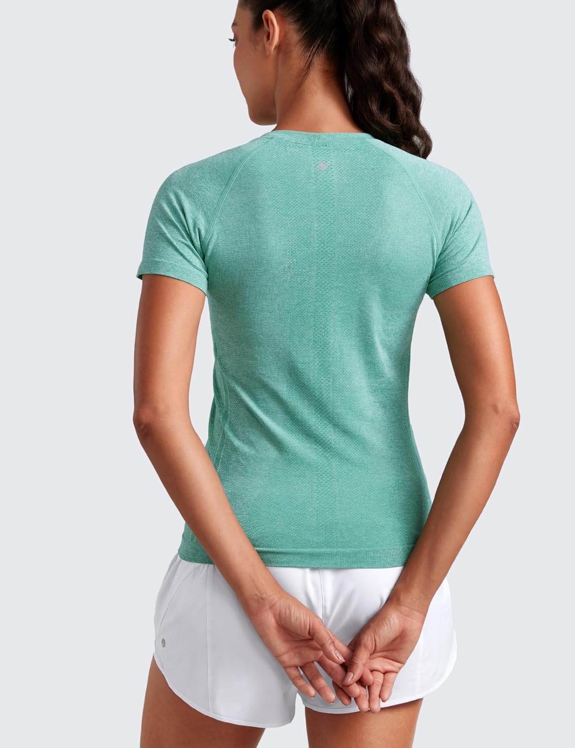 image:imageCRZ YOGA Seamless Workout Tops for Women Hip Length Athletic Running Gym Yoga Short Sleeve Shirts Breathable Crewneck TeesCascadia Green Heather