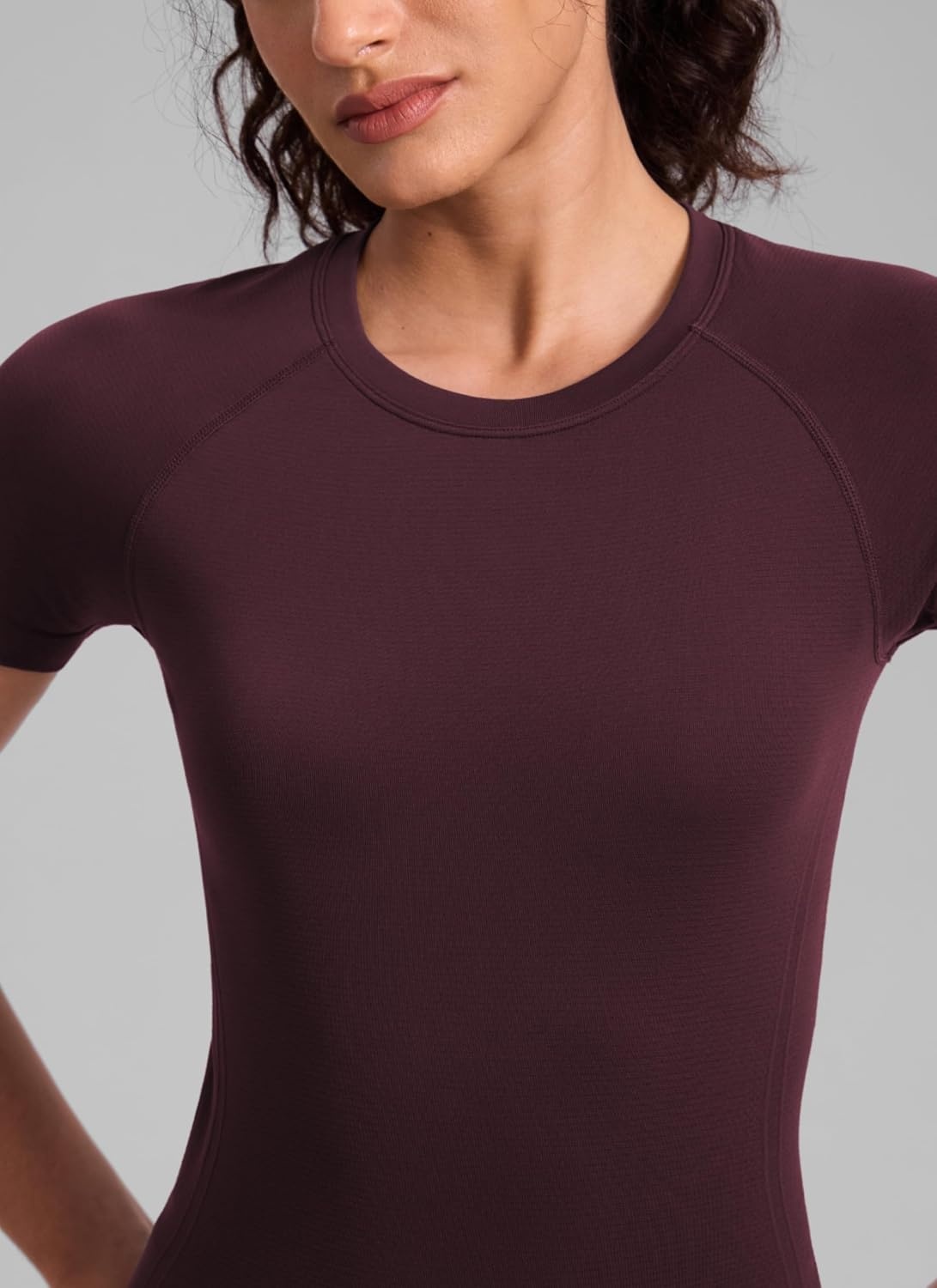 image:imageCRZ YOGA Seamless Workout Tops for Women Hip Length Athletic Running Gym Yoga Short Sleeve Shirts Breathable Crewneck TeesRipe Plum