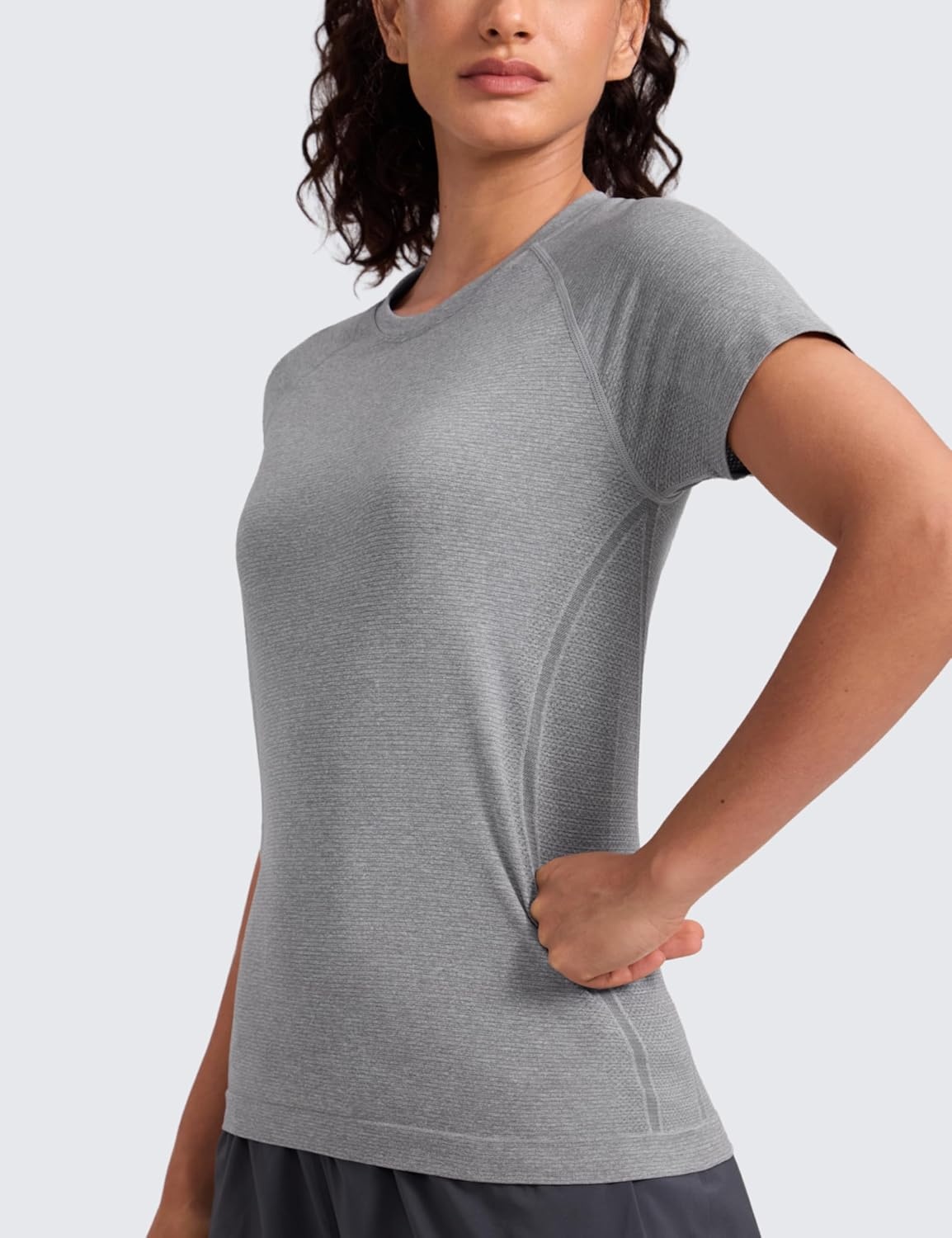 image:imageCRZ YOGA Seamless Workout Tops for Women Hip Length Athletic Running Gym Yoga Short Sleeve Shirts Breathable Crewneck TeesSlate Grey Marl
