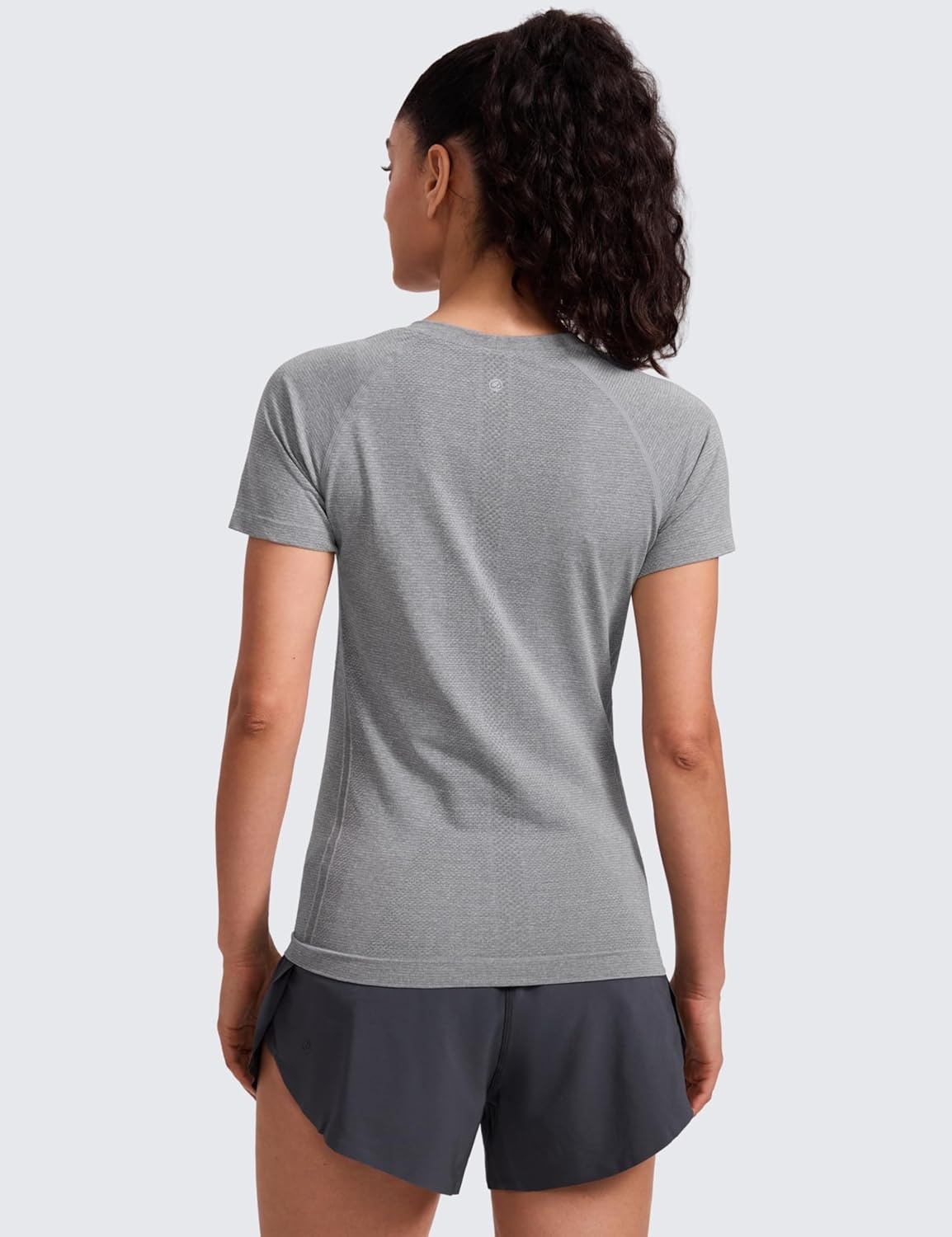 image:imageCRZ YOGA Seamless Workout Tops for Women Hip Length Athletic Running Gym Yoga Short Sleeve Shirts Breathable Crewneck TeesSlate Grey Marl