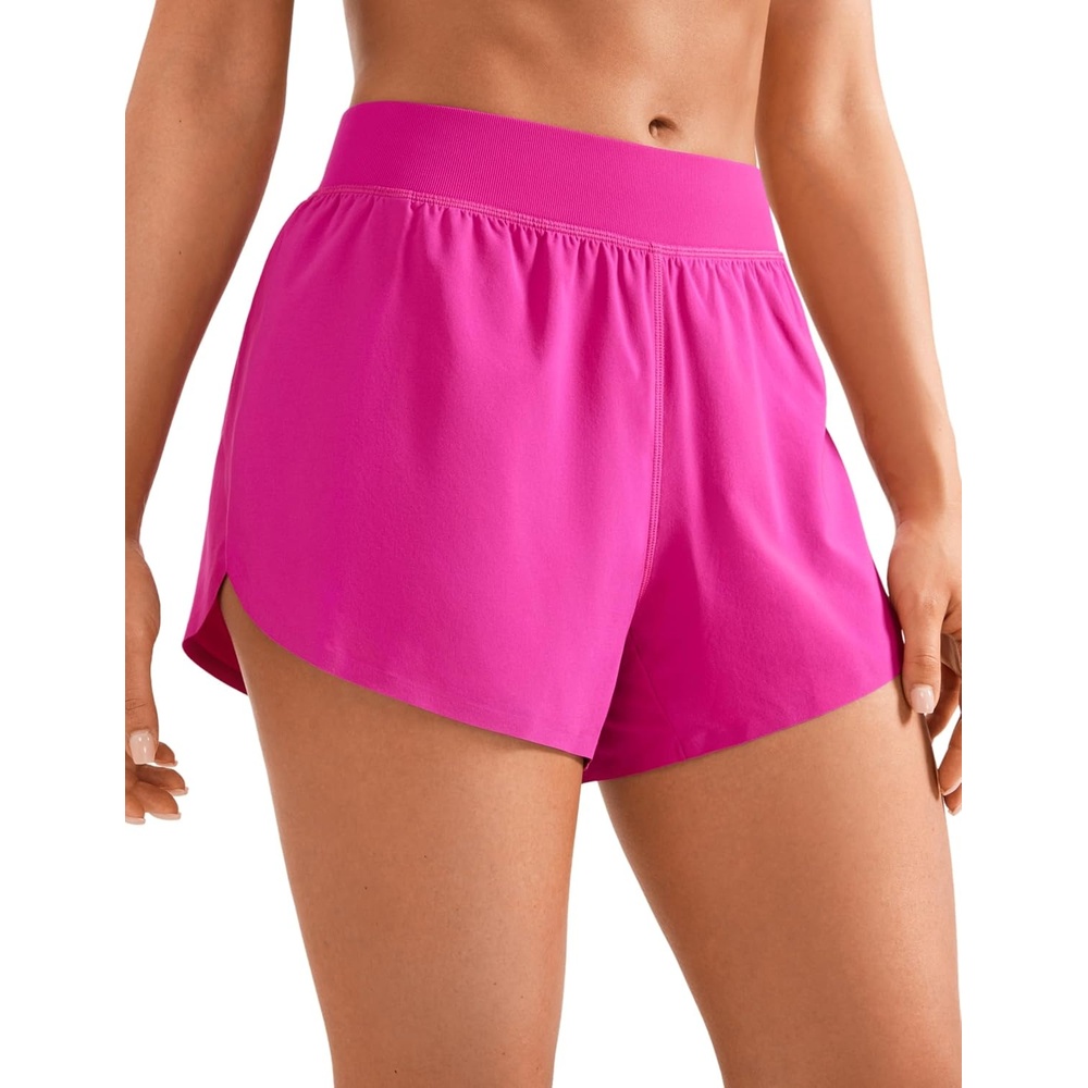 image:imageCRZ YOGA Mid Waisted Split Running Shorts for Women 4 Comfy Mesh Liner for Workout Athletic Gym Track Quick DryHibiscus Purple