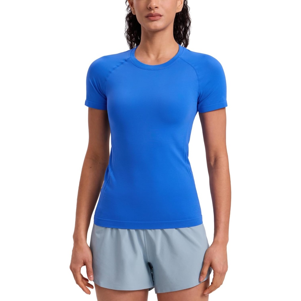 image:imageCRZ YOGA Seamless Workout Tops for Women Hip Length  Athletic Running Gym Yoga Short Sleeve Shirts Breathable Crewneck TeesSparkle Blue