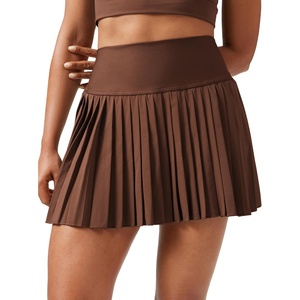 CRZ YOGA High Waisted Pleated Tennis Skirts for Women – Mini Lined Casual Tummy Control Skort with Pockets(Coffee Brown)