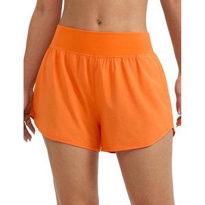 CRZ YOGA Mid Flat Waisted Running Shorts for Women 3″ – Mesh Liner Quick Dry for Workout Sport Athletic with Zipper Pocket(Sparkle Orange)