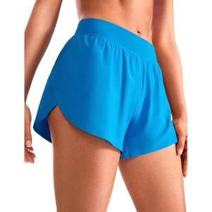 CRZ YOGA Mid Waisted Split Running Shorts for Women 4″ – Comfy Mesh Liner for Workout Athletic Gym Track Quick Dry(Madagascar Blue)