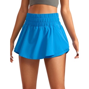 CRZ YOGA Ruffle Skirt Overlay Athletic Shorts for Women – High Waisted Flowy for Workout Running Tennis with Zip Pocket(Madagascar Blue)