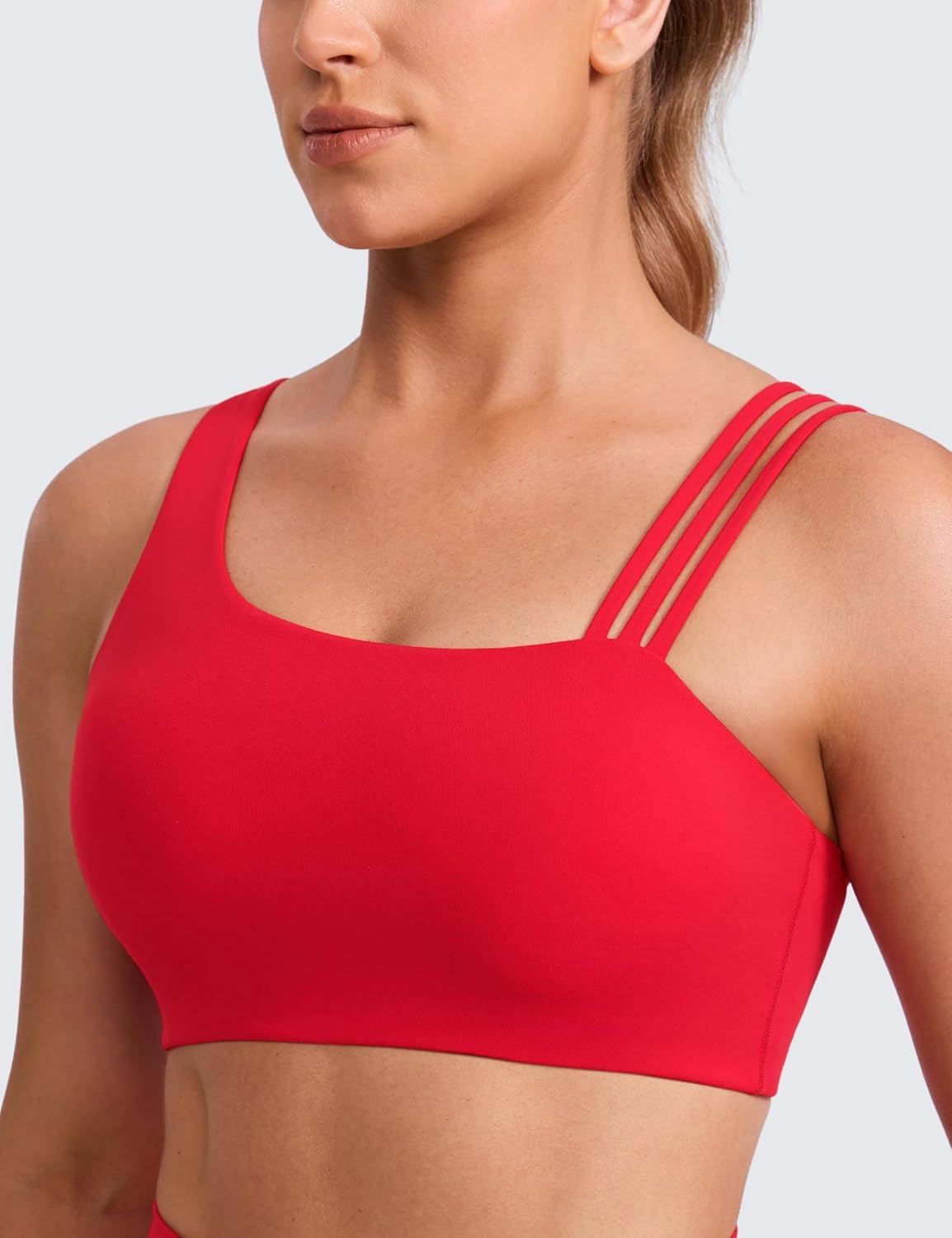 image:imageCRZ YOGA Butterlift Asymmetric Straps Sports Bras for Women Medium Impact Padded Pilates Workout Gym Crop TopAurora Red