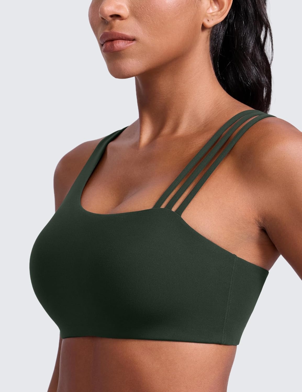image:imageCRZ YOGA Butterlift Asymmetric Straps Sports Bras for Women Medium Impact Padded Pilates Workout Gym Crop TopLegend Green