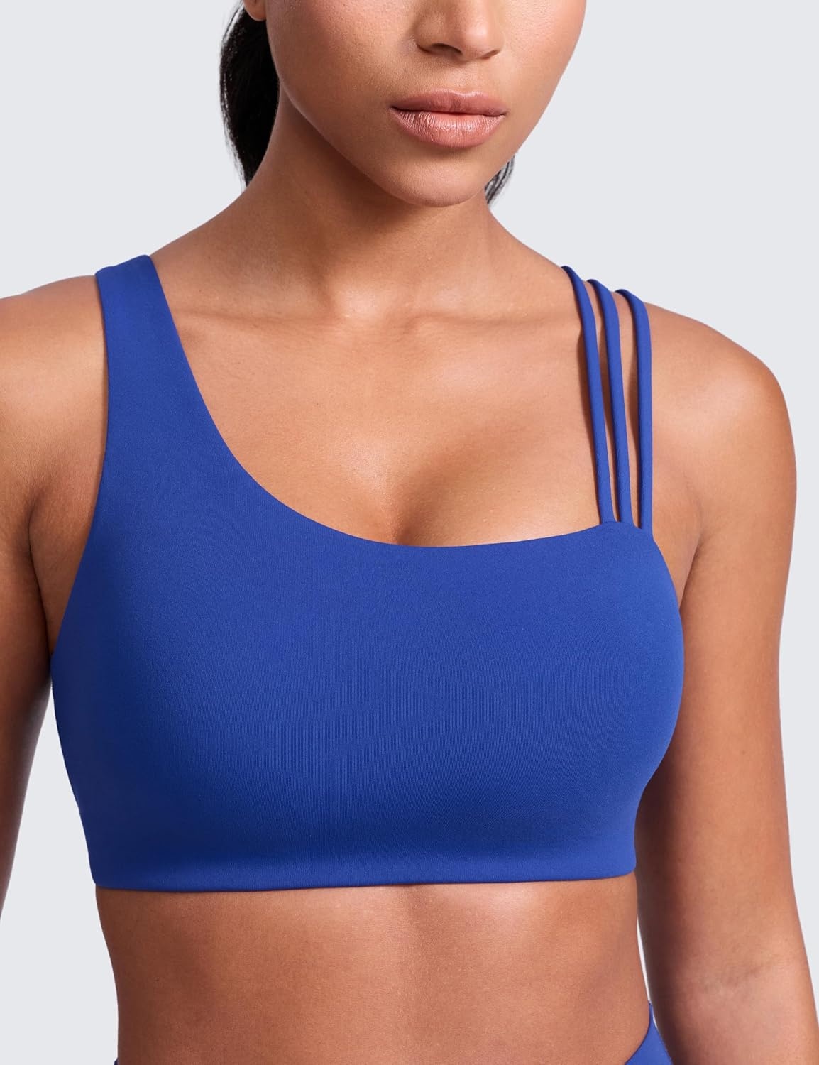 image:imageCRZ YOGA Butterlift Asymmetric Straps Sports Bras for Women Medium Impact Padded Pilates Workout Gym Crop TopWaves Blue
