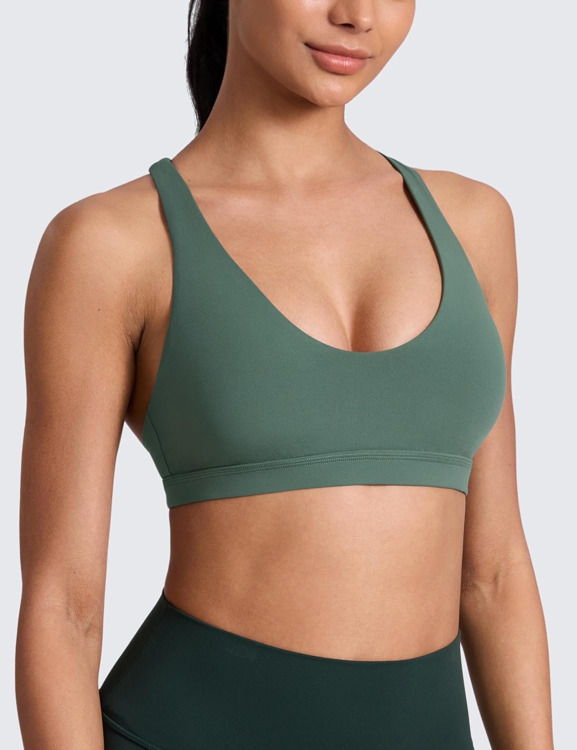 image:imageCRZ YOGA Butterlift Strappy Sports Bras for Women Padded Low Cut Scoop Neck Cross Back Pilates Yoga TopDark Forest Green