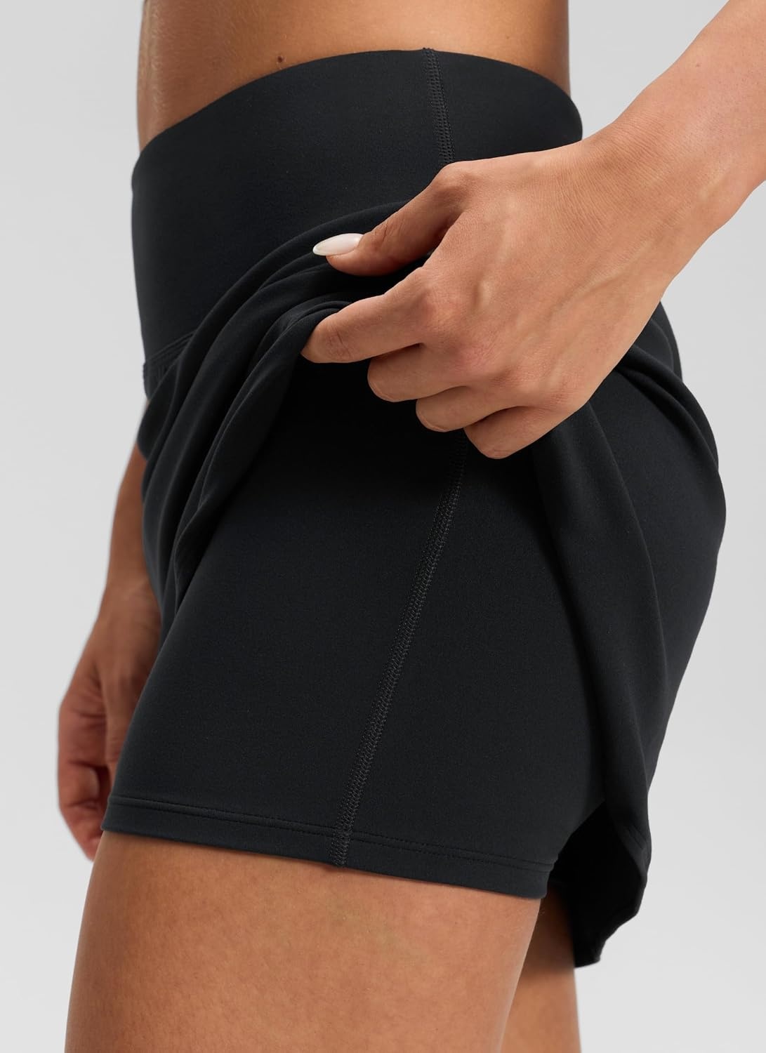 image:imageCRZ YOGA Butterluxe Dolphin High Waisted Golf Skirts for Women Mini Bodycon Casual Vacation Skort with Builtin ShortsBlack