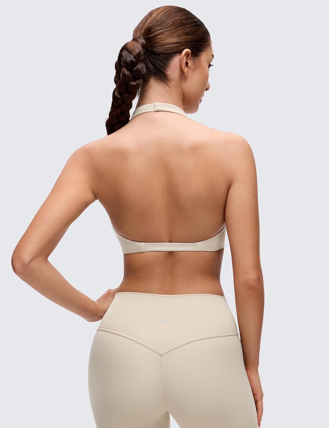 image:imageCRZ YOGA Butterluxe Double Lined Twist Halter Sports Bras for Women Deep V Neck Crop Top Casual Open Back Non PaddedMojave Tan