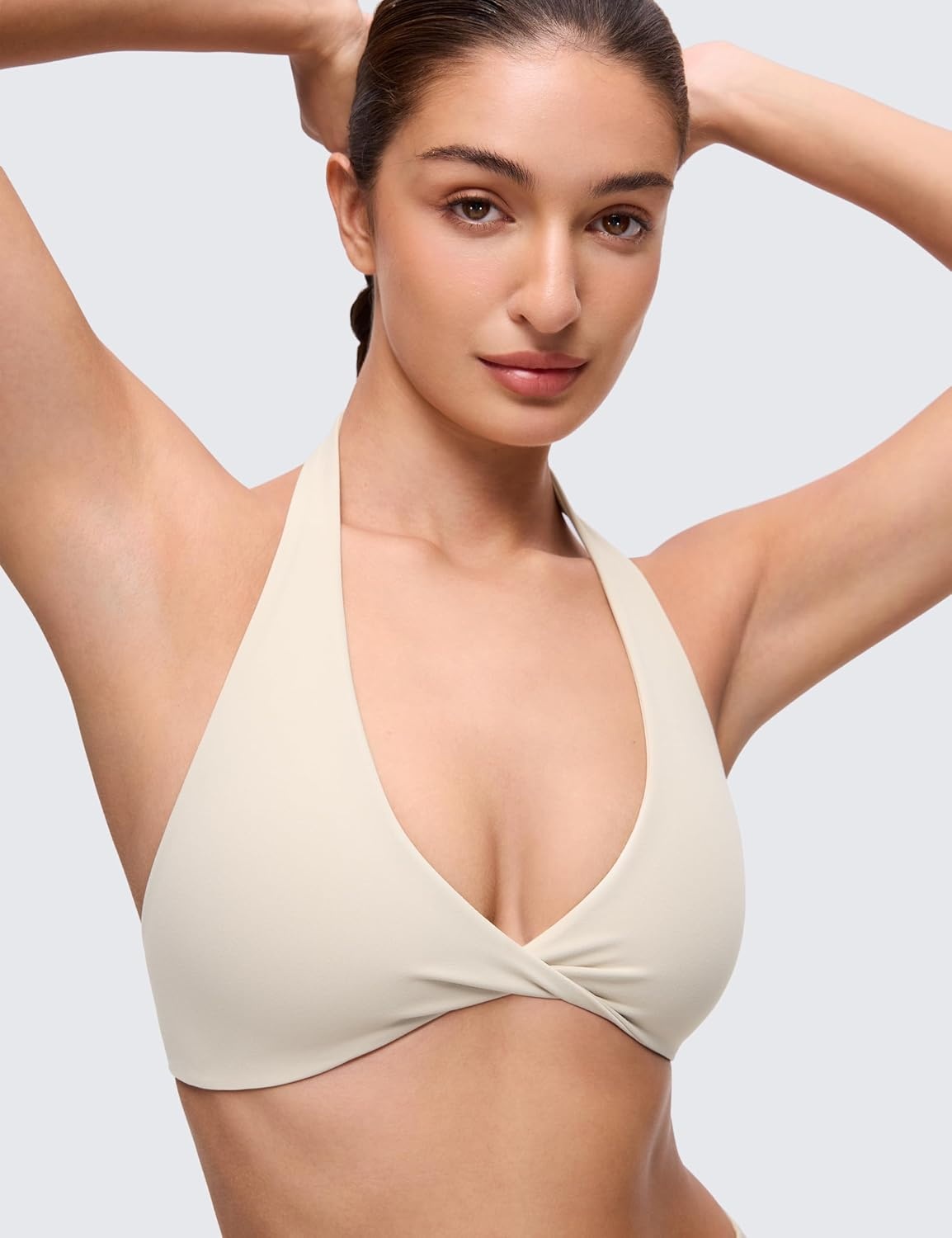 image:imageCRZ YOGA Butterluxe Double Lined Twist Halter Sports Bras for Women Deep V Neck Crop Top Casual Open Back Non PaddedMojave Tan