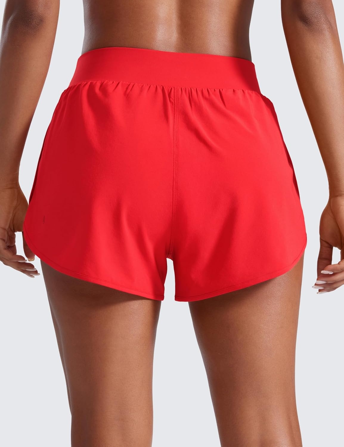 image:imageCRZ YOGA Dolphin Flat Waist Athletic Shorts for Women 3 High Rise Quick Dry for Running Workout Gym Track with Zip PocketsDeep Red