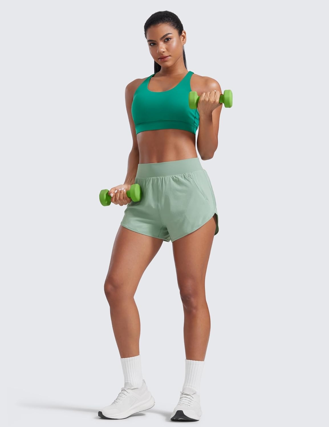 image:imageCRZ YOGA Dolphin Flat Waist Athletic Shorts for Women 3 High Rise Quick Dry for Running Workout Gym Track with Zip PocketsGreen Palm Court