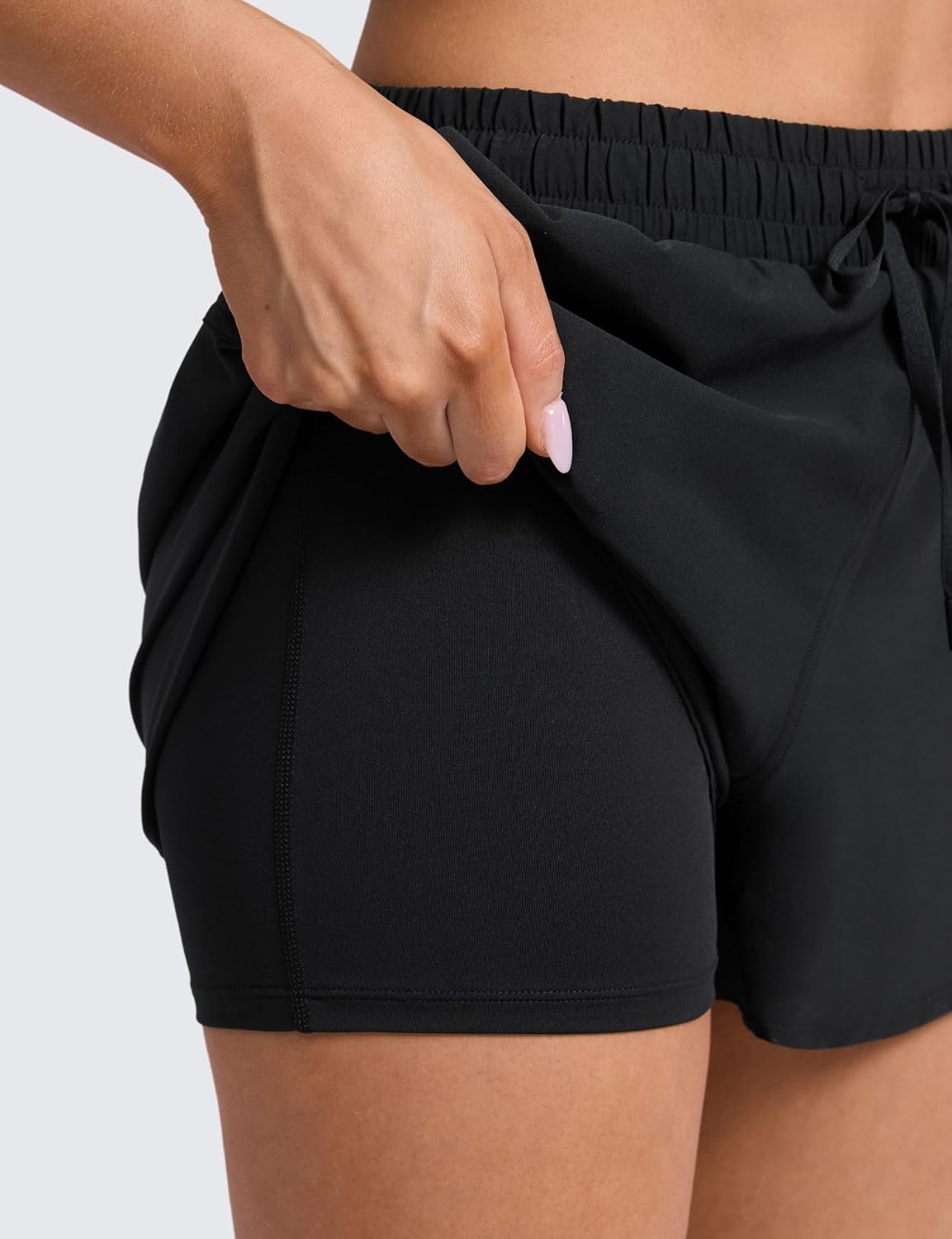 image:imageCRZ YOGA Drapey 2 in 1 Athletic Shorts for Women High Waisted V Slit Casual Tennis Running with PocketsBlack
