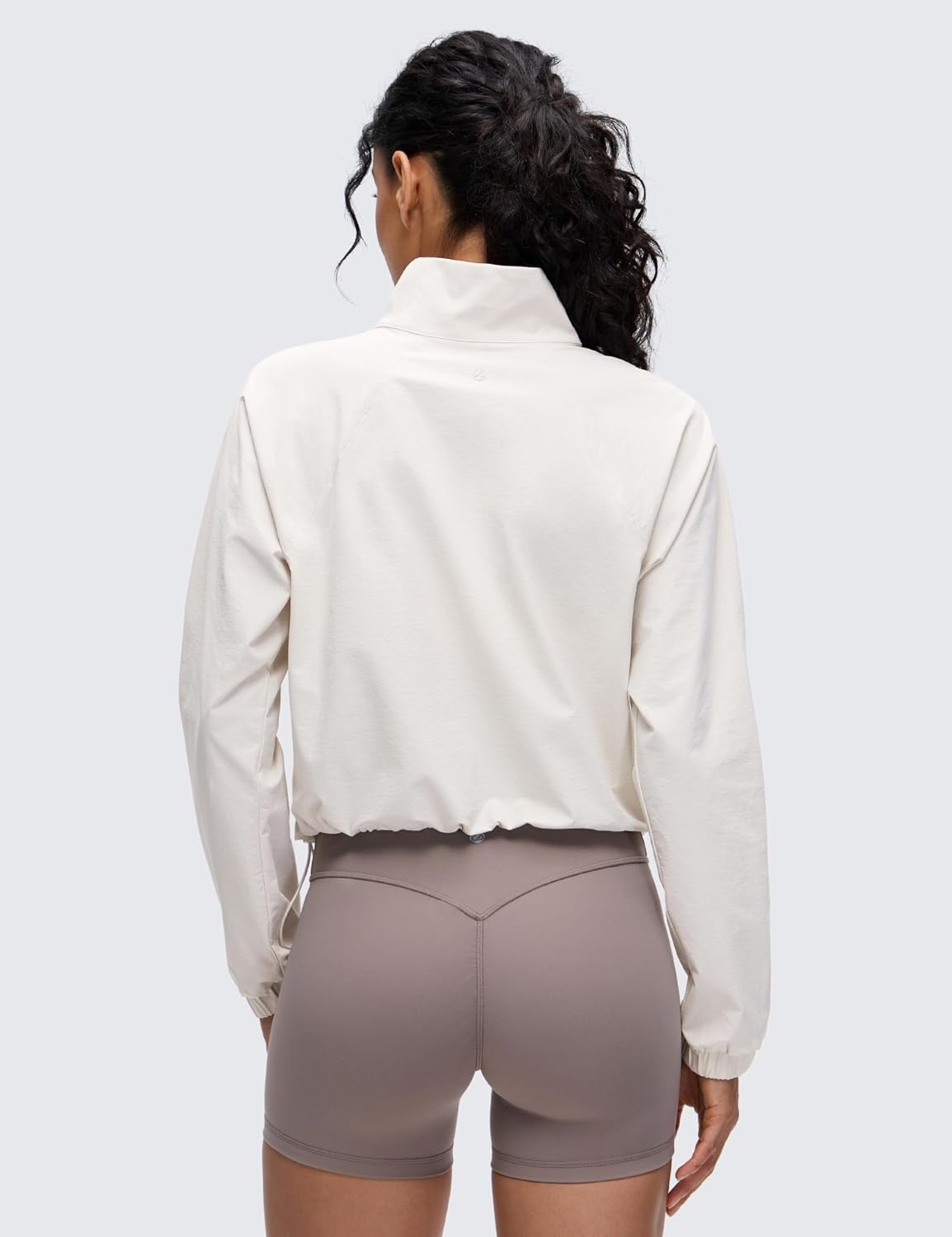 image:imageCRZ YOGA Drawstring Bottom Workout Jackets for Women Half Zip Pullover Cropped Workout Outdoor Tops with PocketsMilky White Bone