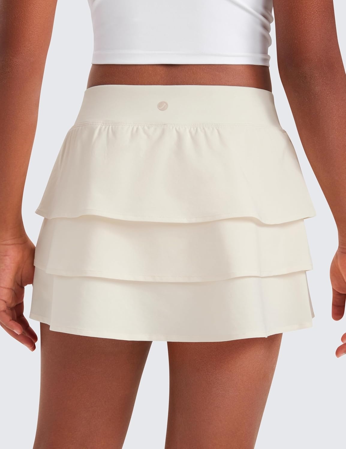 image:imageCRZ YOGA Girls FeatheryFit Soft Ruffle Athletic Skirts Tennis School Casual Skorts with Pockets Liner Kids TeenWhite Apricot