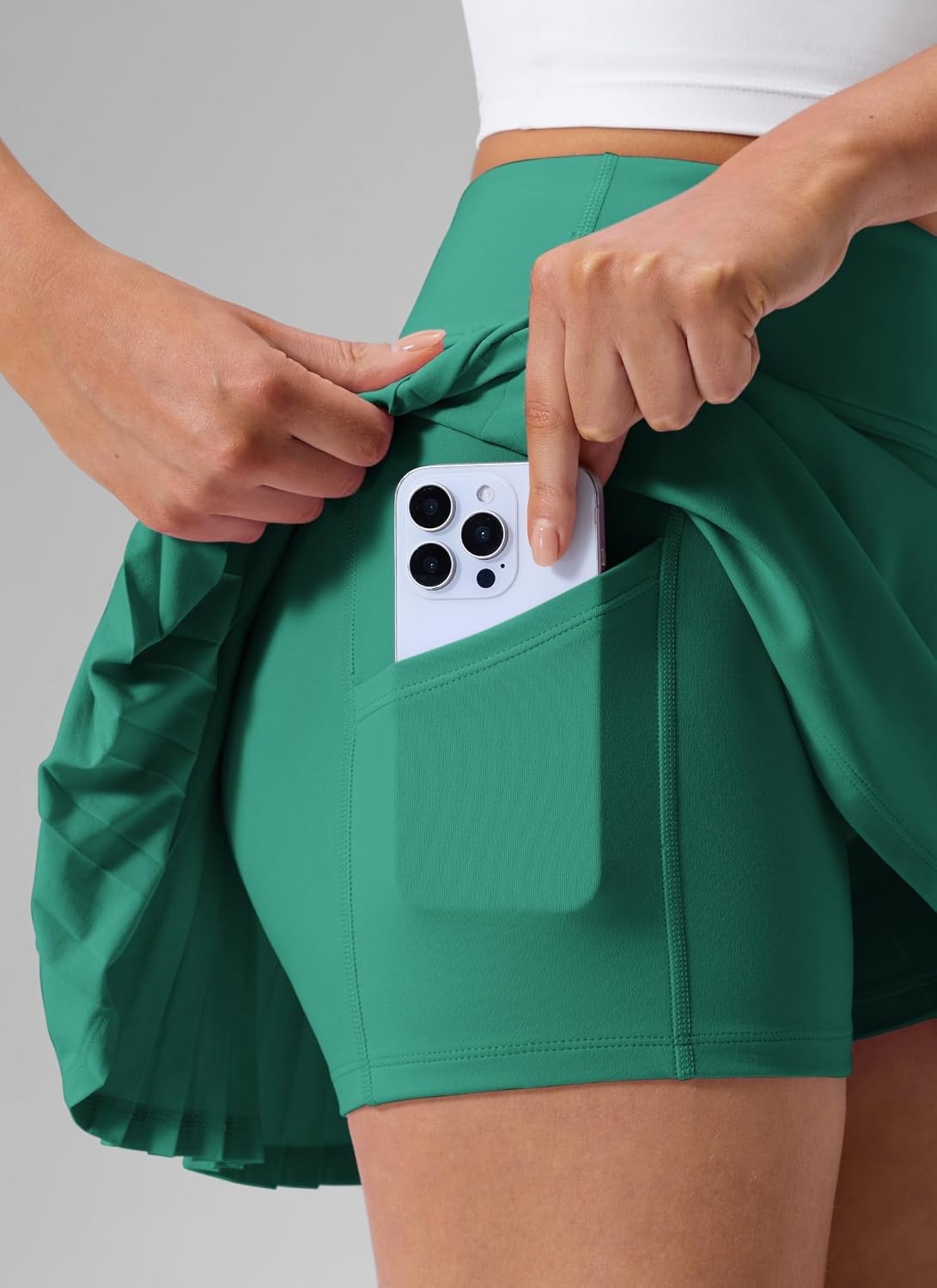 image:imageCRZ YOGA High Waisted Pleated Back Tennis Skirts for Women Aline Front Mini Golf Casual Skort with Inner ShortsCascadia Green