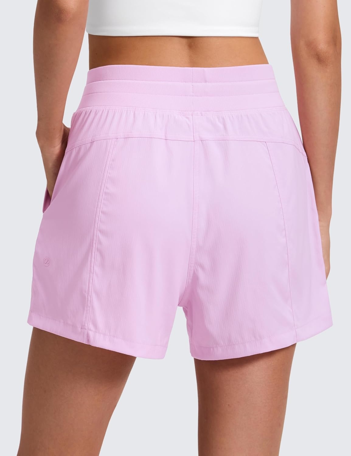 image:imageCRZ YOGA Lightweight Casual Shorts for Women 35 High Waisted Linerless for Athletic Lounge Hiking with Zip PocketsVita Pink