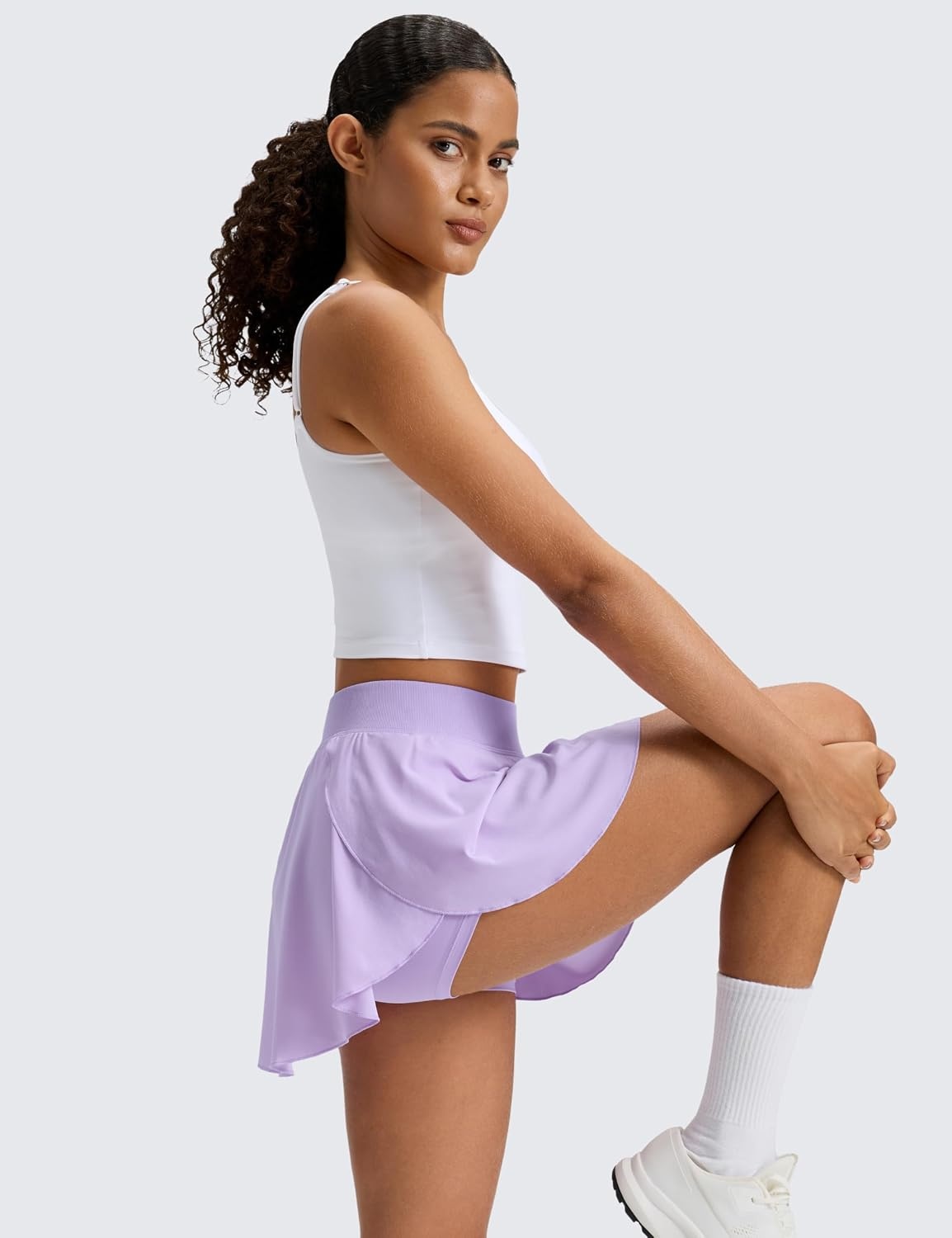 image:imageCRZ YOGA Lightweight Drapey Side Slit Tennis Skirts for Women High Waisted Mini Flowy Lined Golf Skort with PocketsLilac