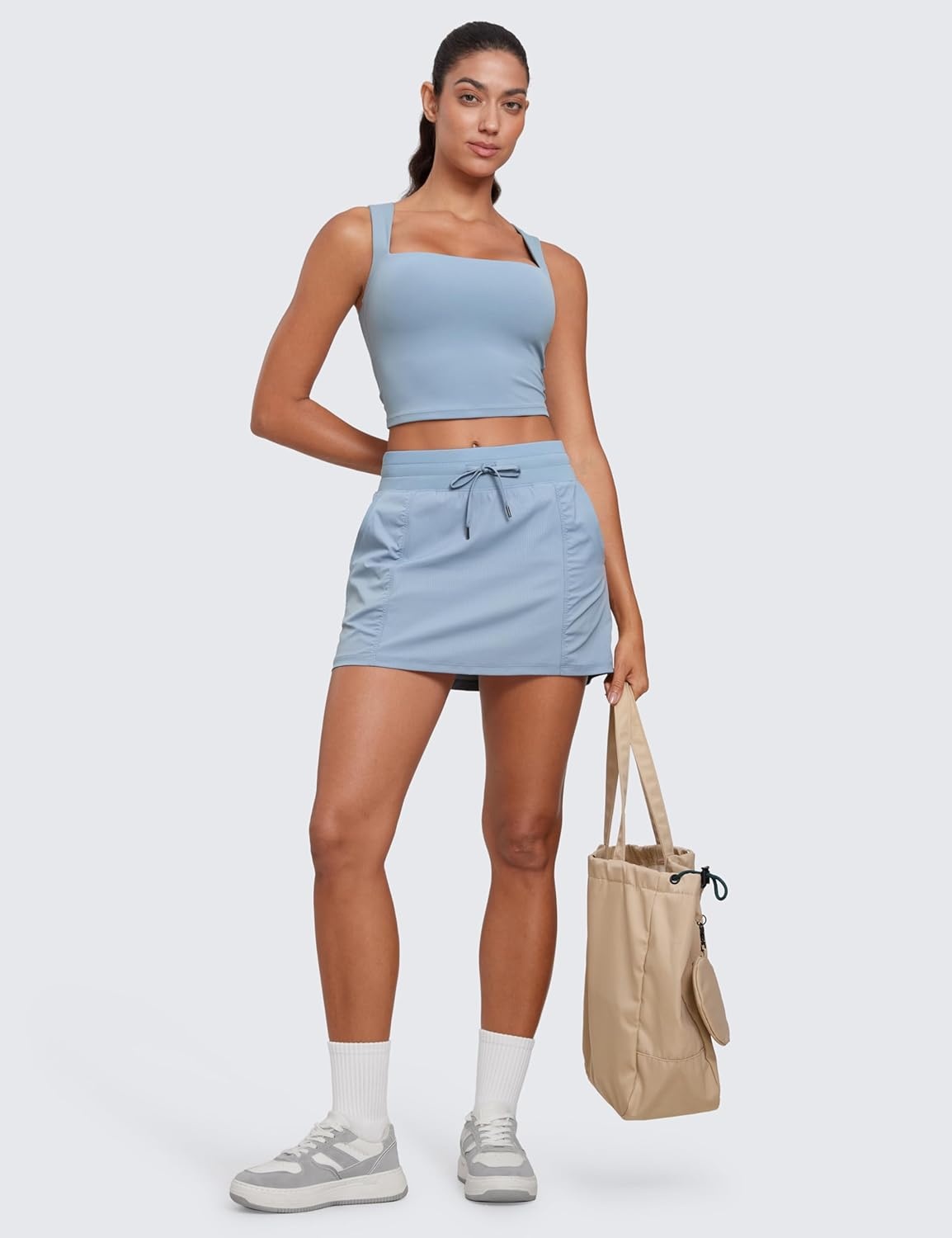 image:imageCRZ YOGA Lightweight Ruched Casual Skirts for Women High Waisted Mini A Line Golf Drawstring Skort with PocketsCambric Blue