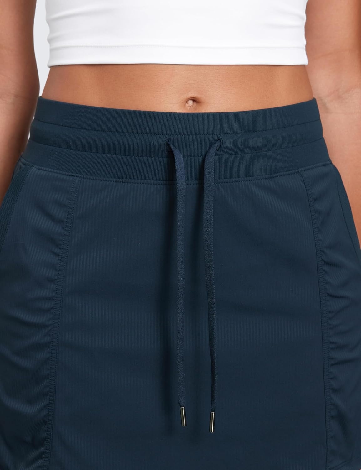 image:imageCRZ YOGA Lightweight Ruched Casual Skirts for Women High Waisted Mini A Line Golf Drawstring Skort with PocketsInk Blue