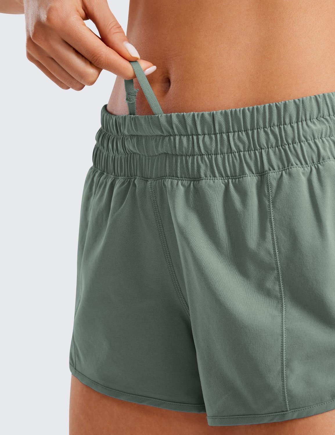 image:imageCRZ YOGA Low Waisted Running Shorts for Women 25 Mesh Liner Quick Dry for Workout Sport Athletic with Zipper PocketGrey Sage