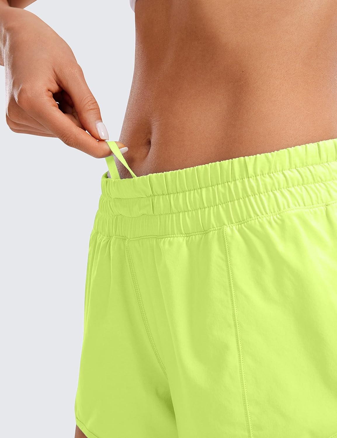 image:imageCRZ YOGA Low Waisted Running Shorts for Women 25 Mesh Liner Quick Dry for Workout Sport Athletic with Zipper PocketNeon Yellow