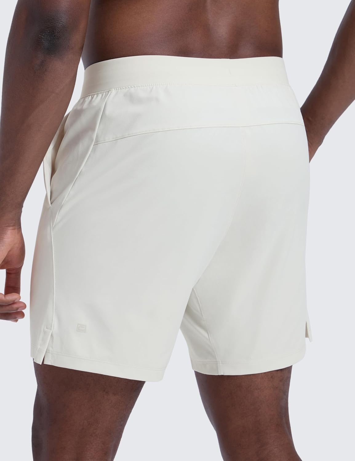 image:imageCRZ YOGA Mens Linerless Motion Shorts 7 Side Split Workout Daily Quick Dry for Gym Athletic Casual with PocketsMilky White Bone