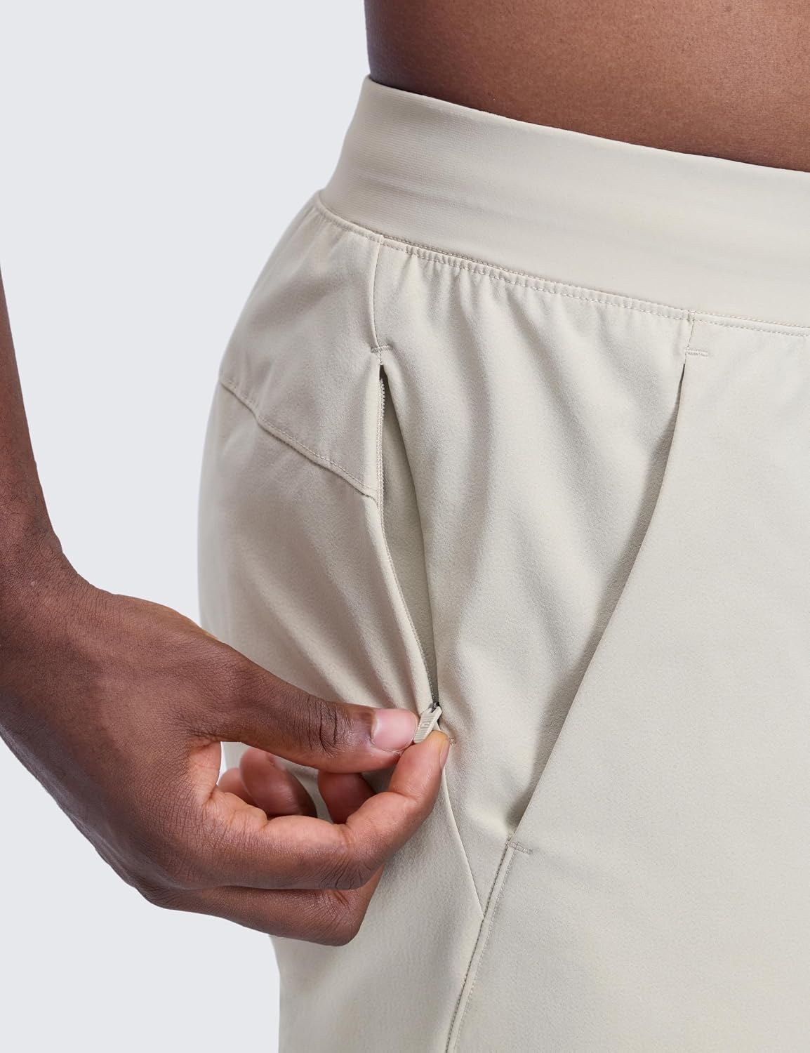 image:imageCRZ YOGA Mens Linerless Motion Shorts 7 Side Split Workout Daily Quick Dry for Gym Athletic Casual with PocketsMojave Tan
