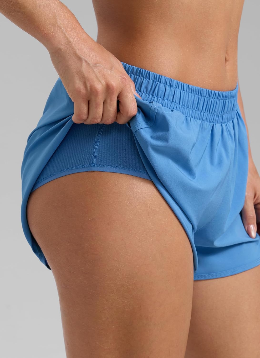image:imageCRZ YOGA Mid Rise Half Split Athletic Shorts for Women 25 Dolphin Quick Dry for Gym Running Workout TrackParty Blue