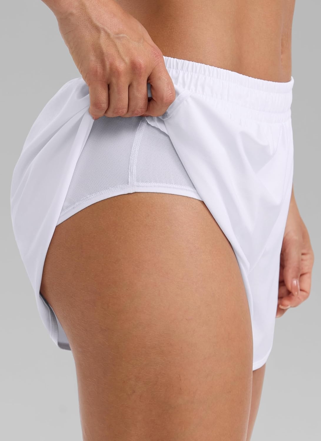 image:imageCRZ YOGA Mid Rise Half Split Athletic Shorts for Women 25 Dolphin Quick Dry for Gym Running Workout TrackWhite