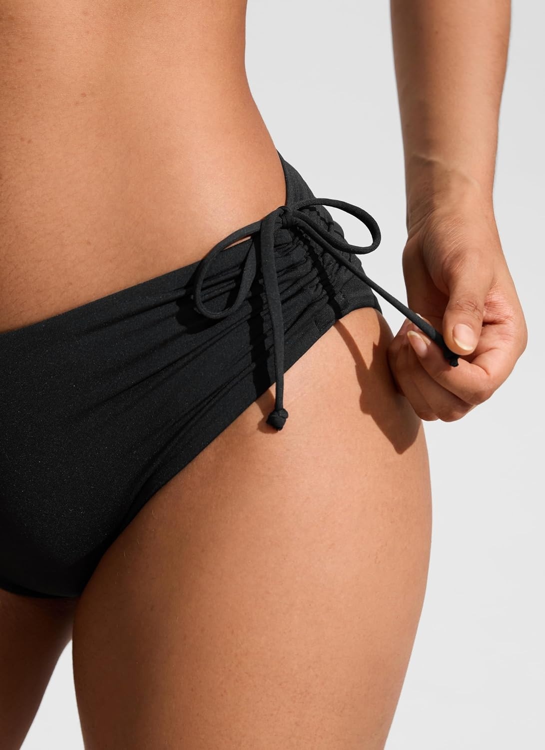 image:imageCRZ YOGA Mid Waisted Ruched Bikini Bottoms for Women Full Coverage Bathing Swimsuit Adjustable Side Tie Swim BriefsBlack