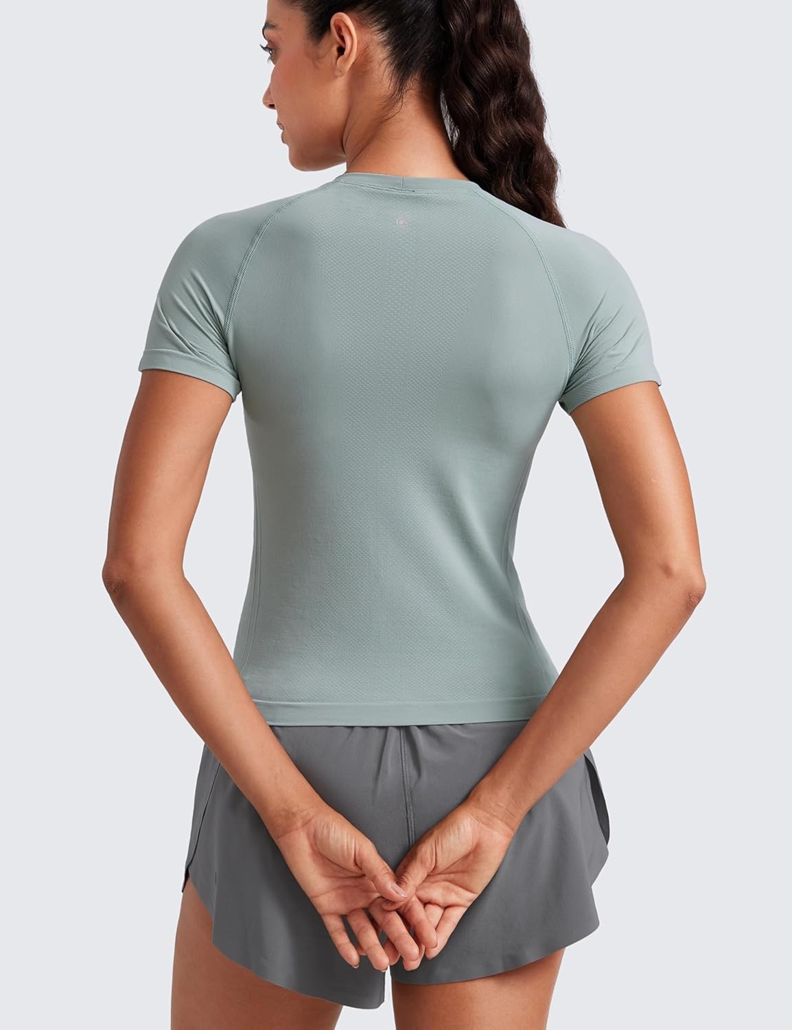 image:imageCRZ YOGA Seamless Workout Tops for Women Waist Length Running Gym Athletic Yoga Short Sleeve Shirts Breathable CrewneckGreen Palm Court
