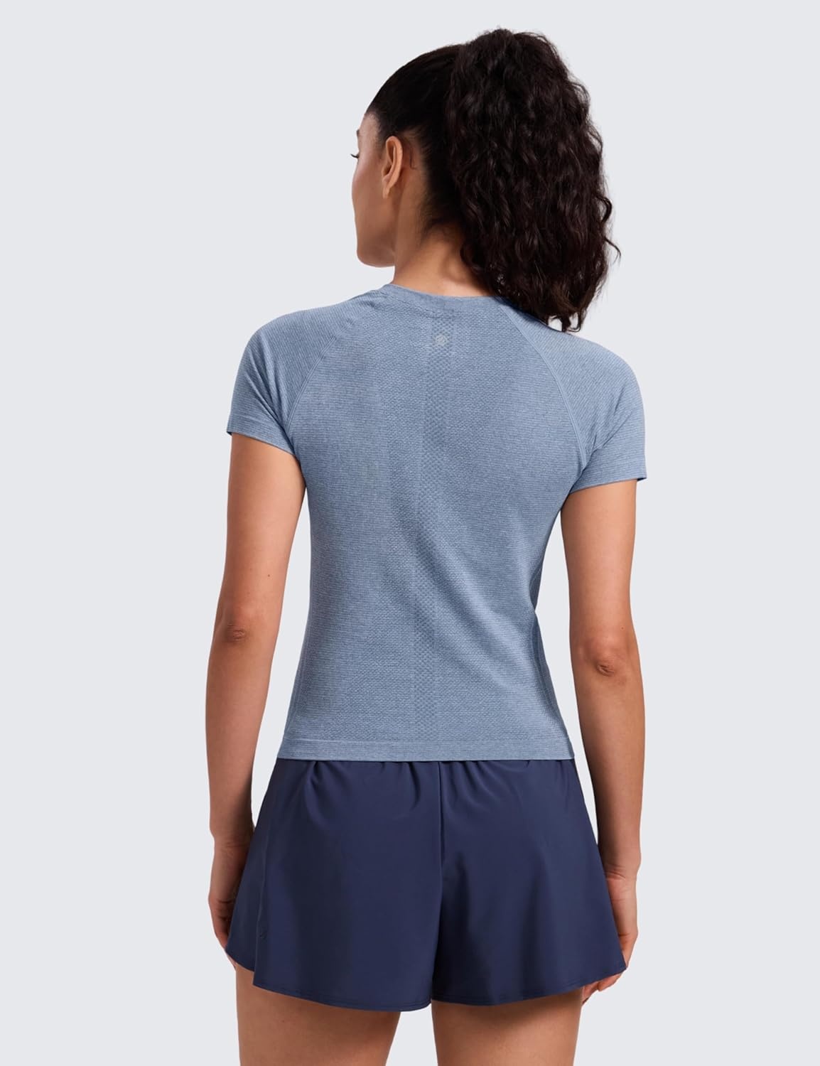 image:imageCRZ YOGA Seamless Workout Tops for Women Waist Length Running Gym Athletic Yoga Short Sleeve Shirts Breathable CrewneckOasis Blue Heather